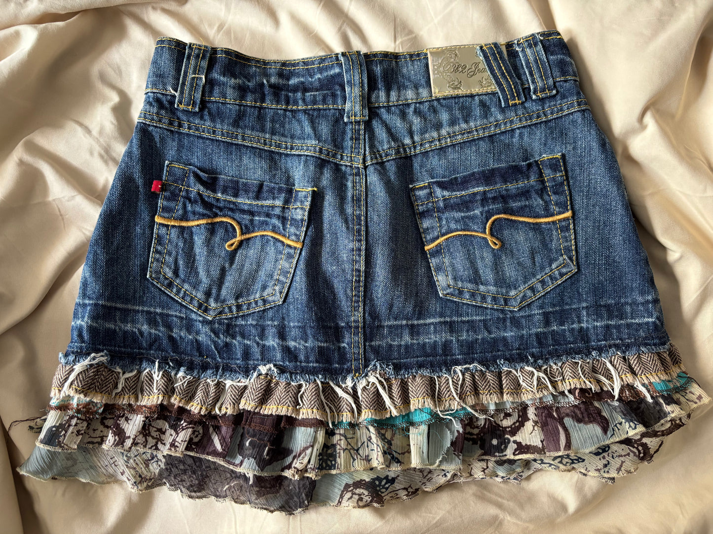 Denim Mini Skirt with Layered Ruffle Hem